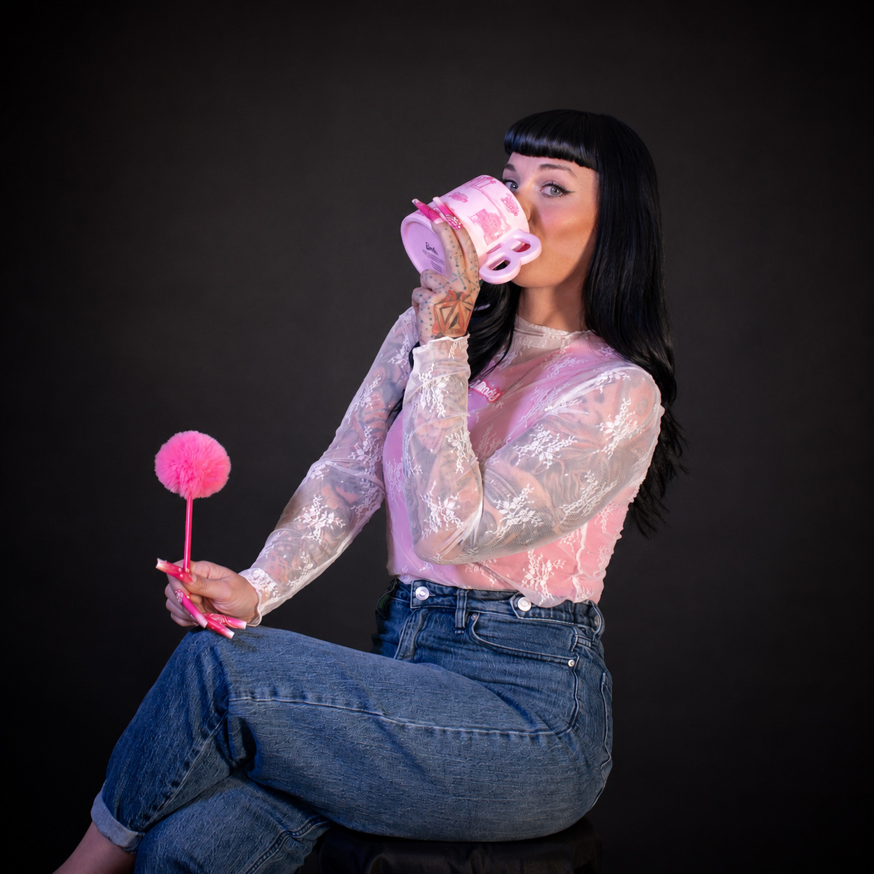 Mindy with her pink coffee mug